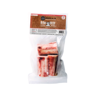 Package of raw beef marrow bones with a visible brand label on a white background