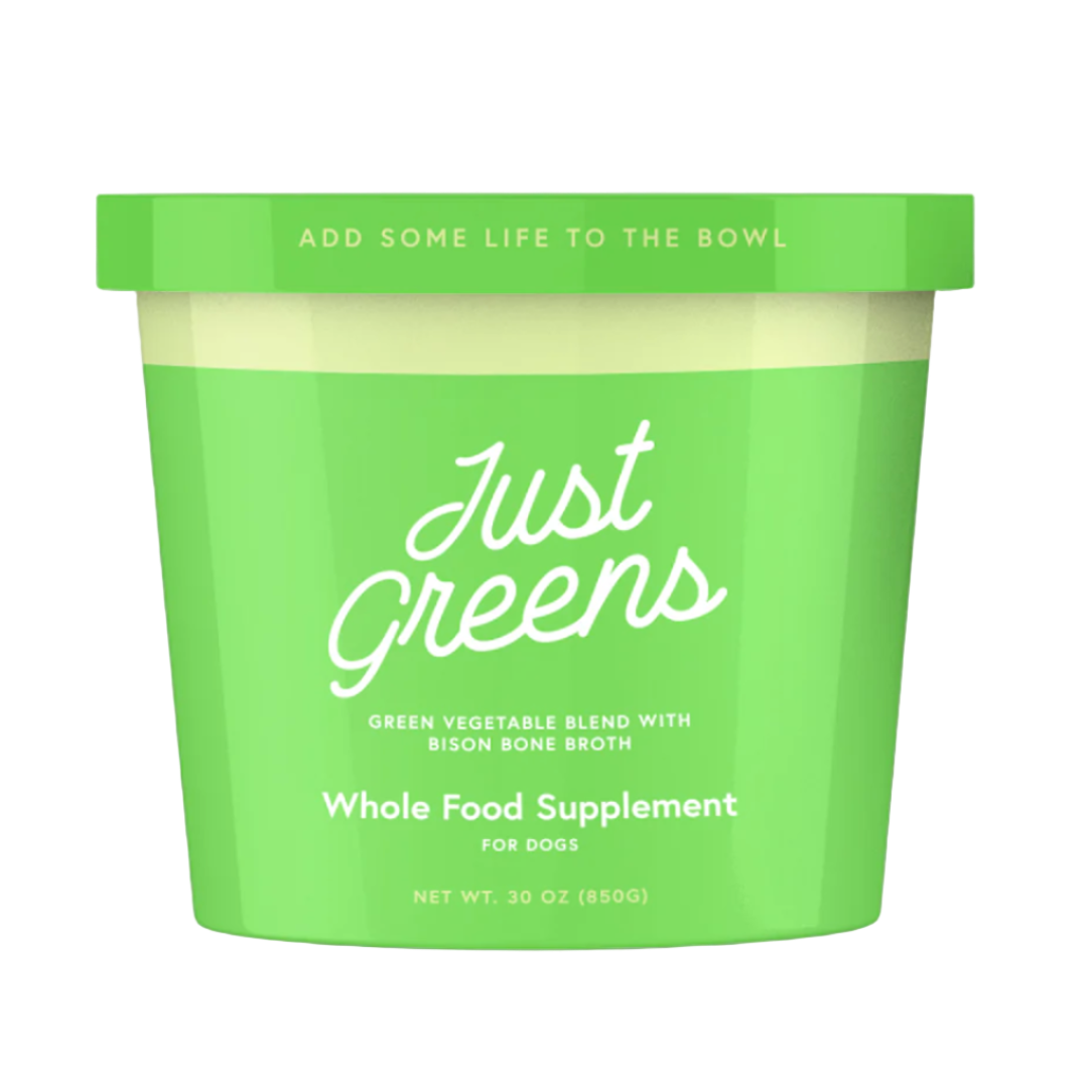 Green container of 'Just Greens' whole food supplement for dogs on a white background