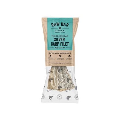 Vital Essentials Raw Bar Silver Carp Filet dog treat in a clear stand-up pouch with a teal and beige label, showing the freeze-dried fish-shaped treat inside.