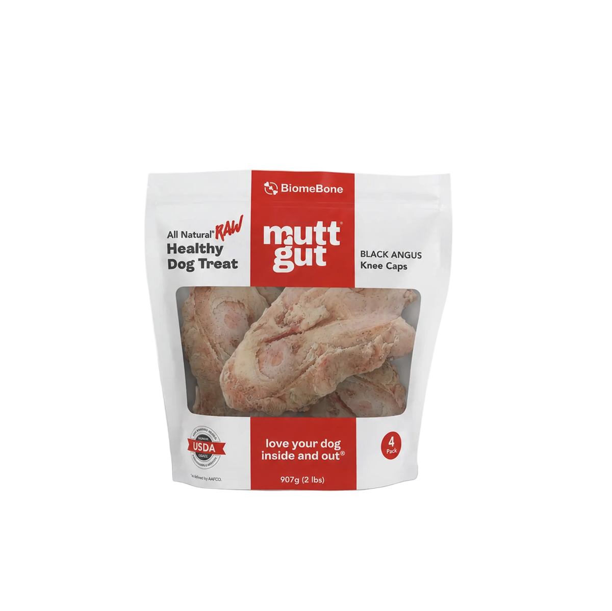 BiomeBone mutt gut dog treat pouch in black angus knee caps flavor, featuring a clear window showing the raw meat treats inside, on a white background.