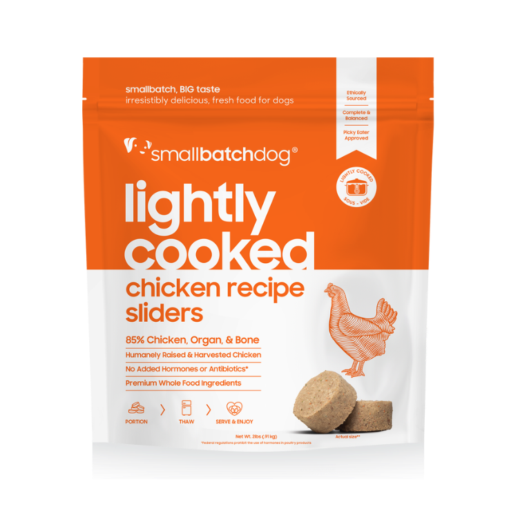 Package of 'Smallbatchdog' lightly cooked chicken recipe sliders for dogs on an orange and white background.