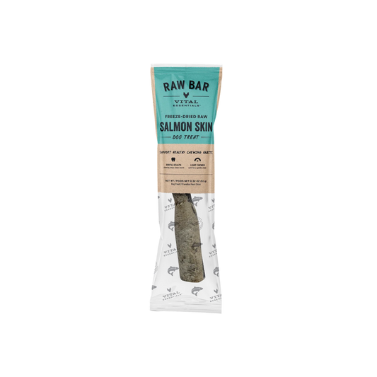 A packaged dog treat on a plain white background. The package is branded RAW BAR by VITAL ESSENTIALS and reads 'Salmon Skin Freeze-Dried Raw Dog Treat.