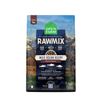 A package of Open Farm RawMix dog food with a grain-free kibble formula. The bag is colorfully illustrated with images of dogs, a chef, and ingredients like meat and grains.
