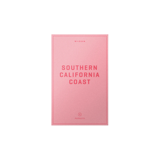 A pink guidebook titled 'SOUTHERN CALIFORNIA COAST' by WILDSAM.