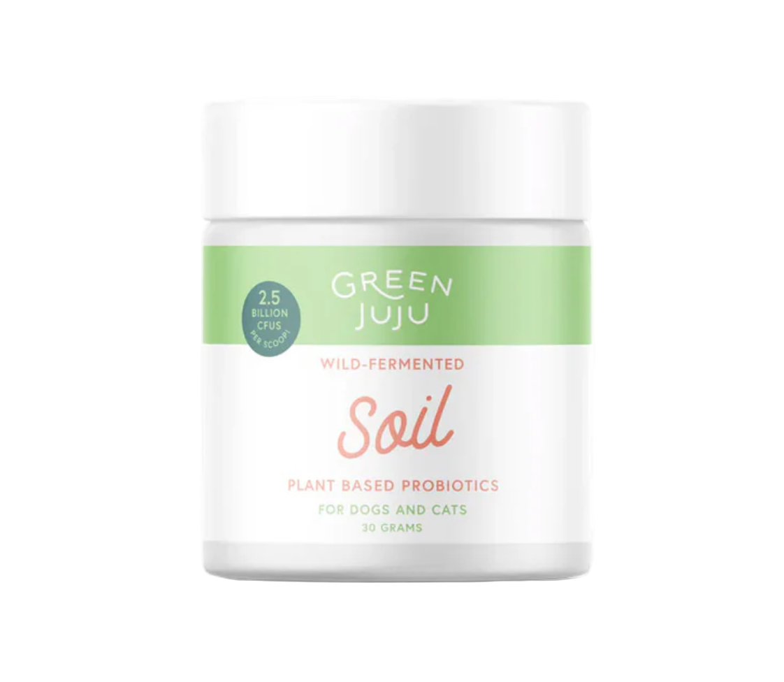 Green Juju soil product container on a white background
