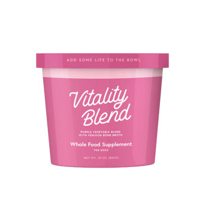 Pink container of 'Vitality Blend' whole food supplement for dogs on a white background