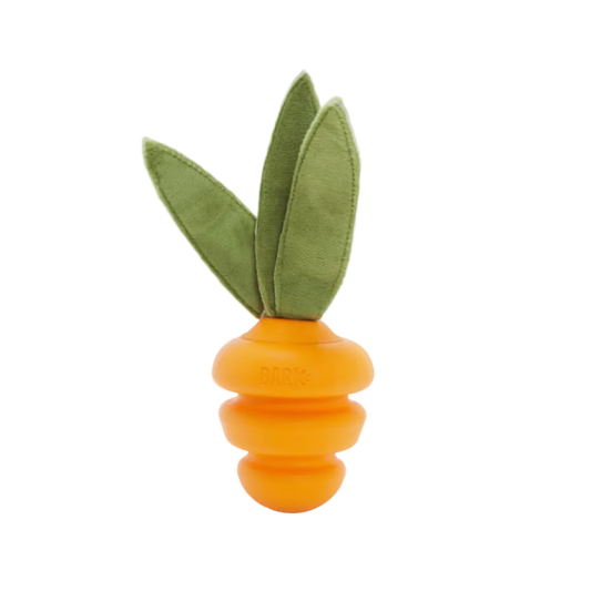 Carrot-shaped toy with green leaves on a white background