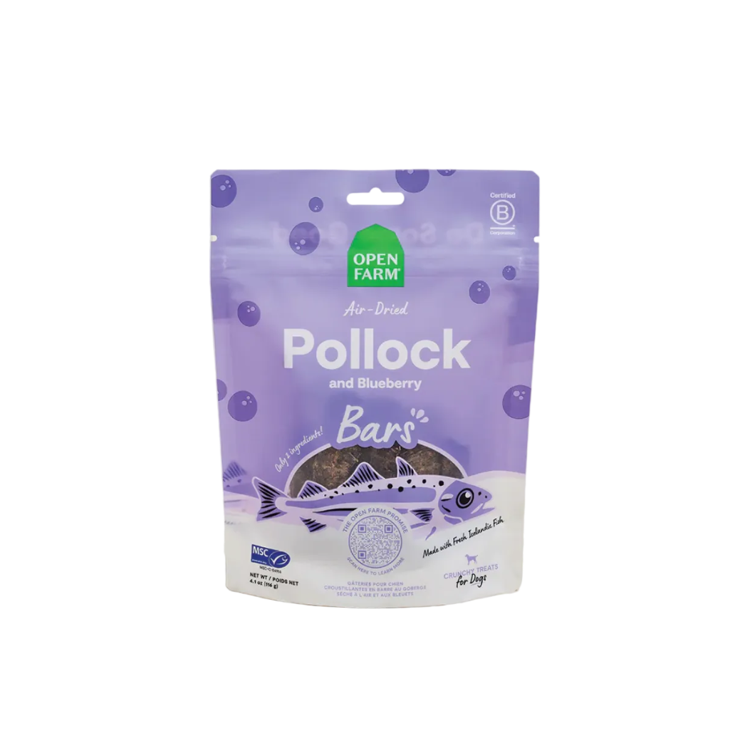 Purple package of Open Farm Pollock and Blueberry Bars on a beige background