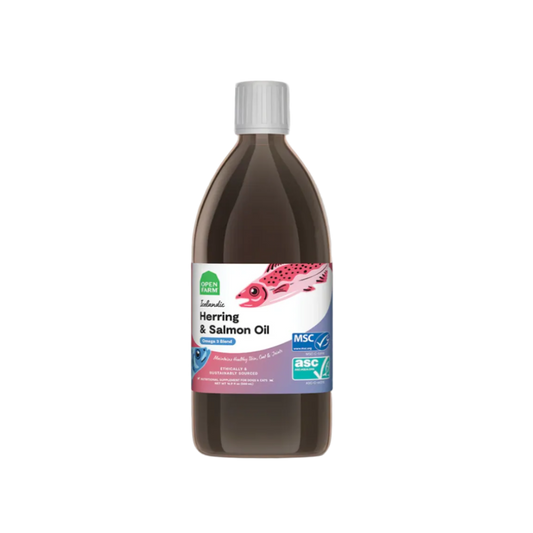 Bottle of herring and salmon oil with a label on a beige background