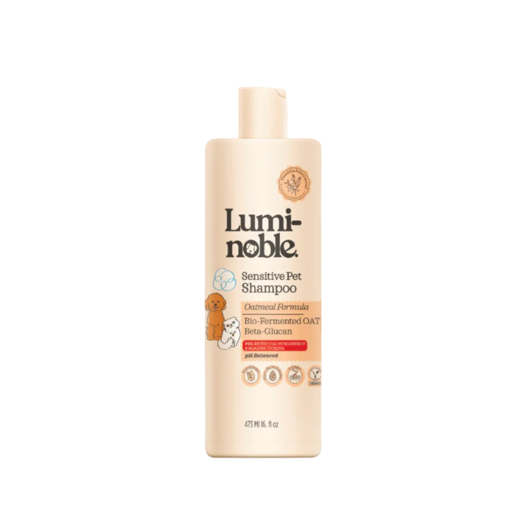 Luminoble sensitive pet shampoo bottle on a beige background