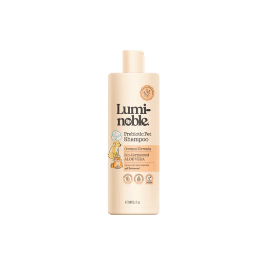 Lumi-noble prebiotic pet shampoo bottle on a beige background