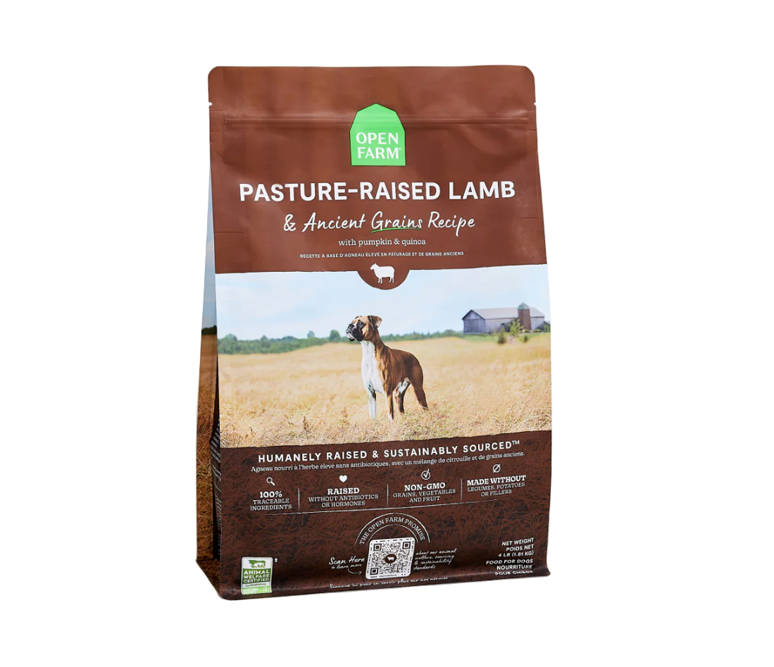 Bag of Open Farm pasture-raised lamb and ancient grains recipe dog food on a beige background