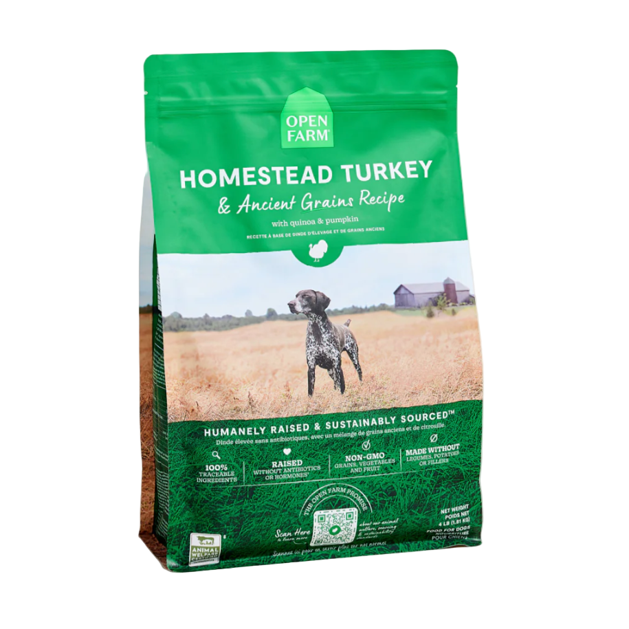 Green bag of Open Farm Homestead Turkey & Ancient Grains recipe dog food on a beige background