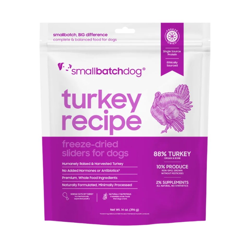 Small batch dog food package with purple and white design on a white background