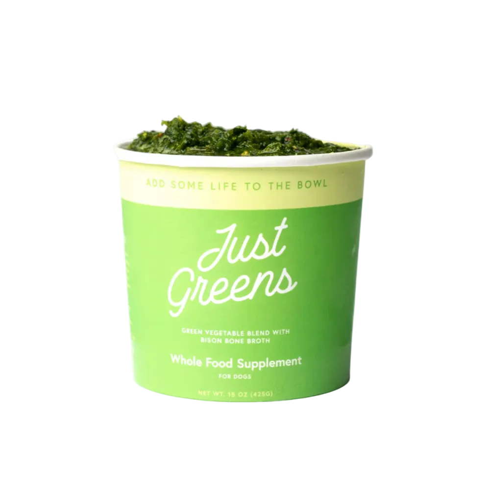 Green container of 'Just Greens' whole food supplement for dogs on a white background