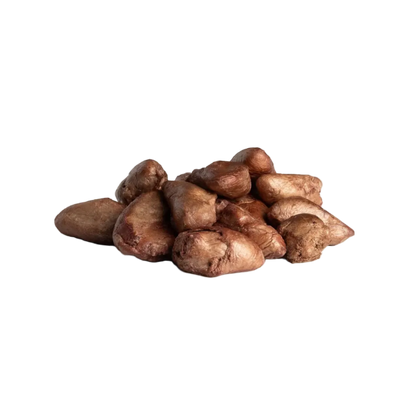 Pile of freeze-dried chicken hearts on a white background.