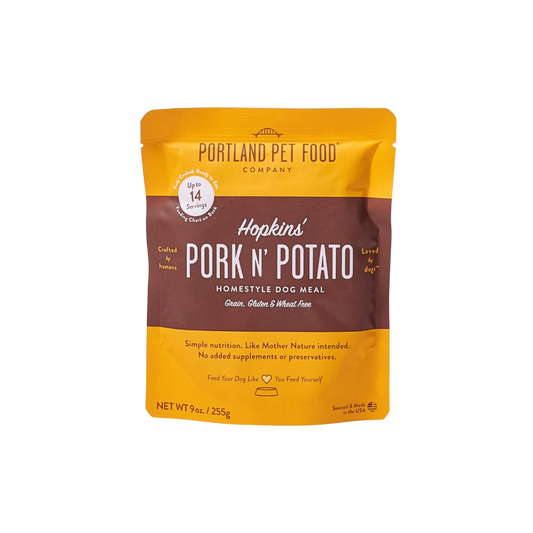 Dog food package from Portland Pet Food Company with 'Hopkins' Pork N' Potato' flavor.