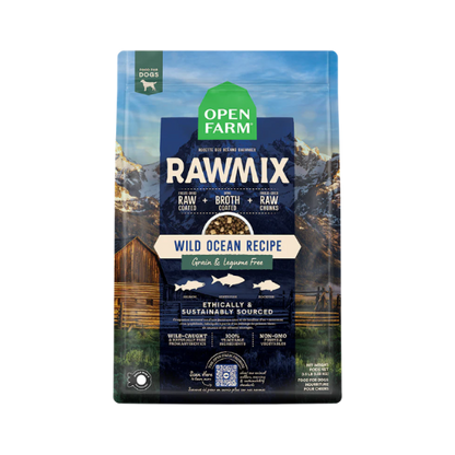A package of Open Farm RawMix dog food with a grain-free kibble formula. The bag is colorfully illustrated with images of dogs, a chef, and ingredients like meat and grains.